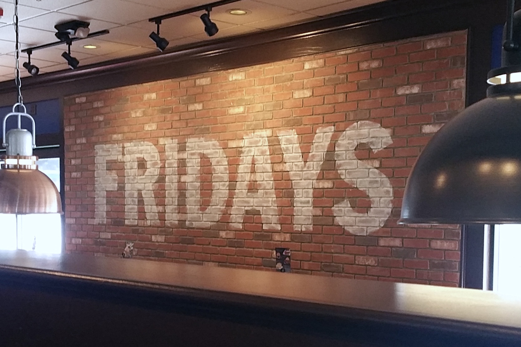 TGI Fridays hand painted ghost sign graphic mural