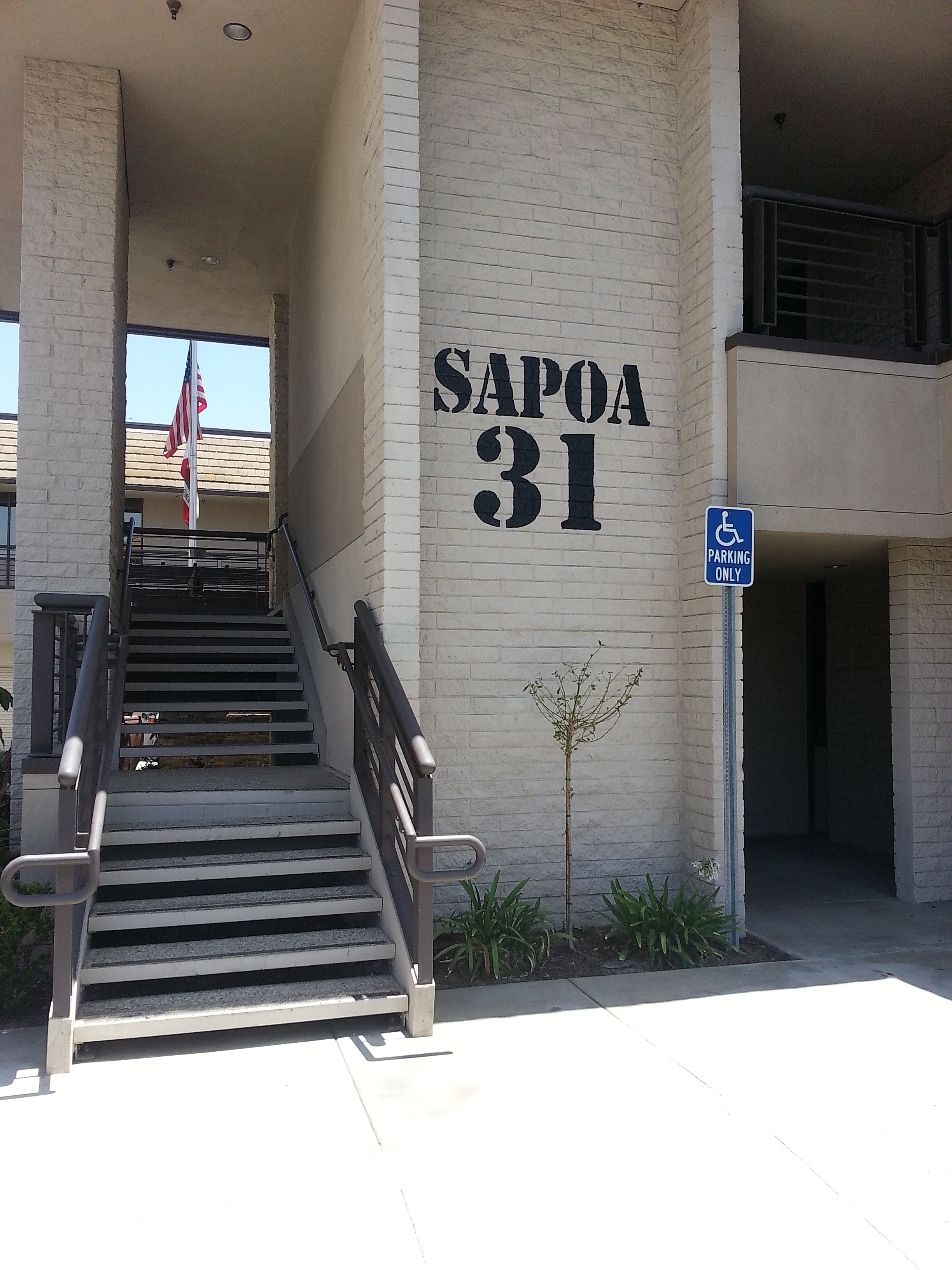 SAPOA hand painted sign mural