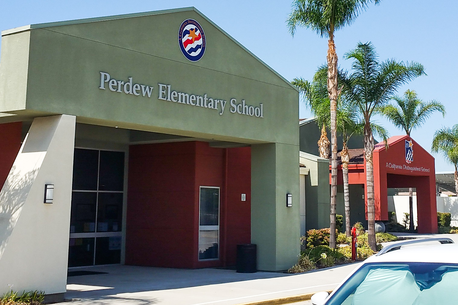 Perdew Elementary Distinguished School Award signs