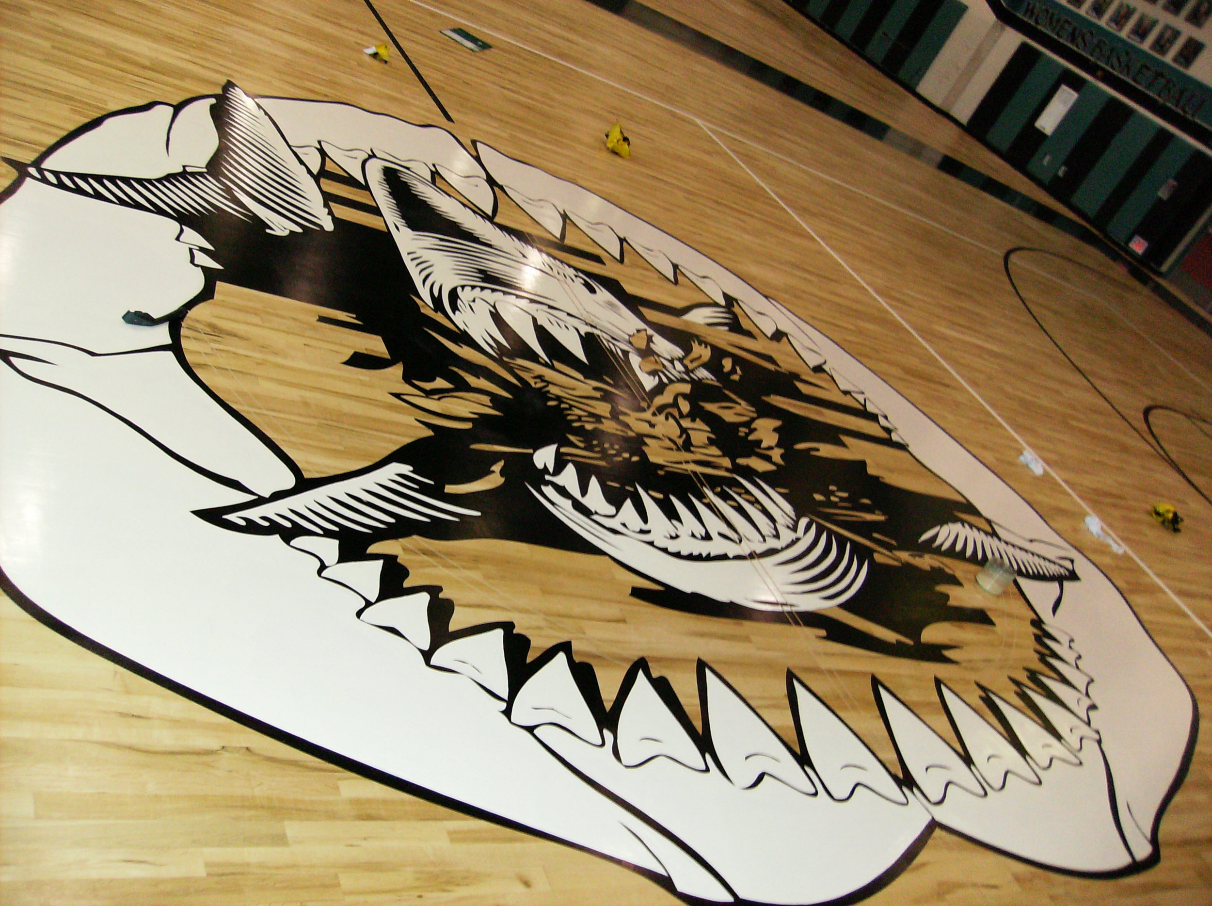 Santiago High School gym wood floor hand painted graphics