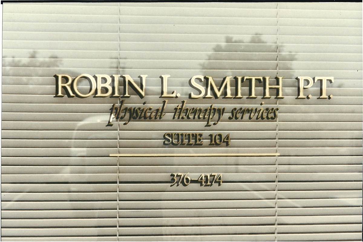Robin Smith Physical Therapy gold leaf office window sign