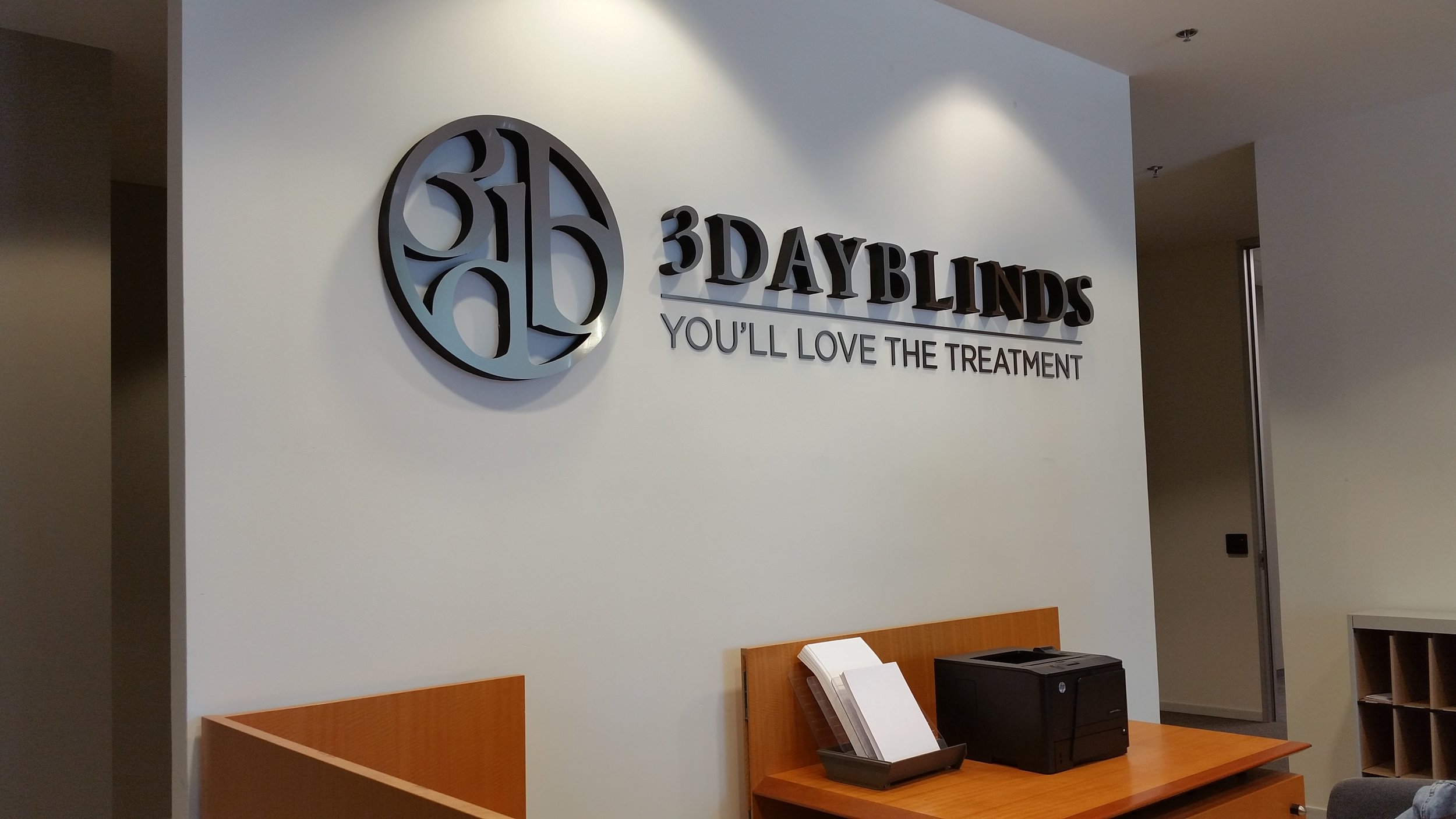 3 Day Blinds reception lobby dimensional letters and logo