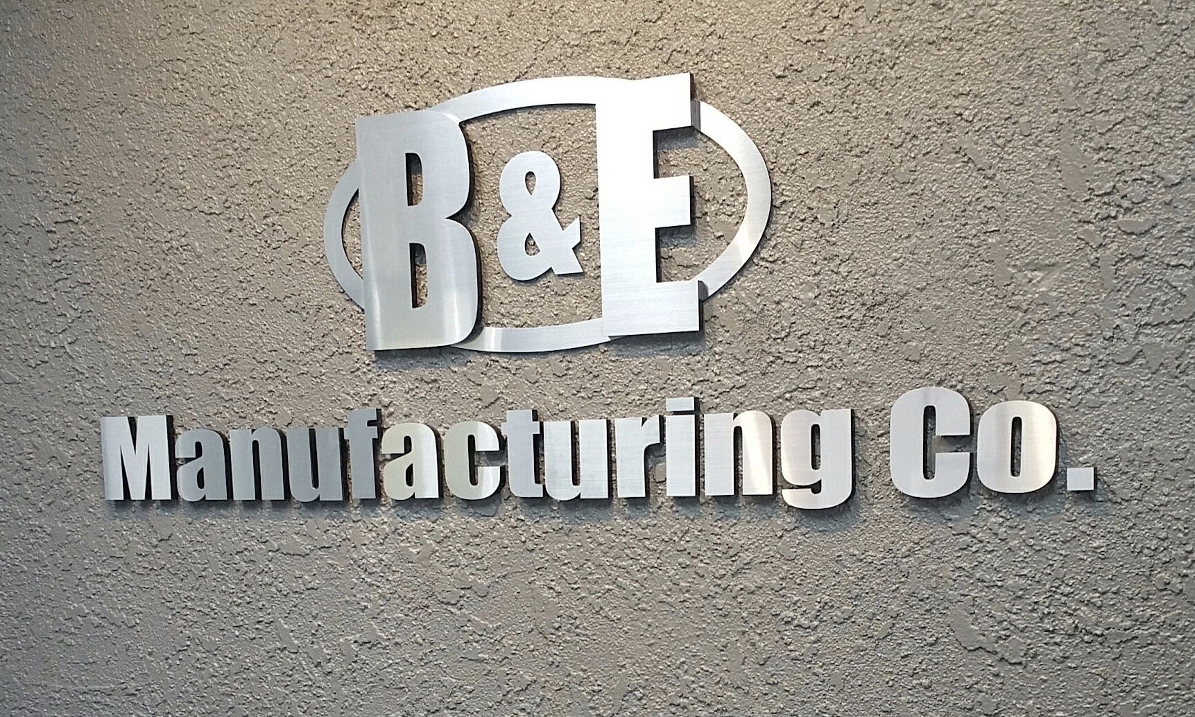 B&E Manufacturing lobby dimensional letters & logo