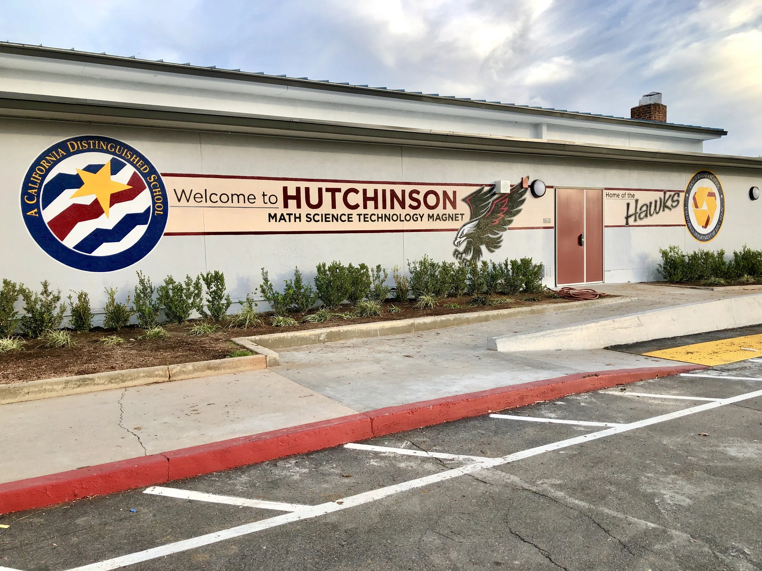 Hutchinson Middle School hand painted school mascot and award murals