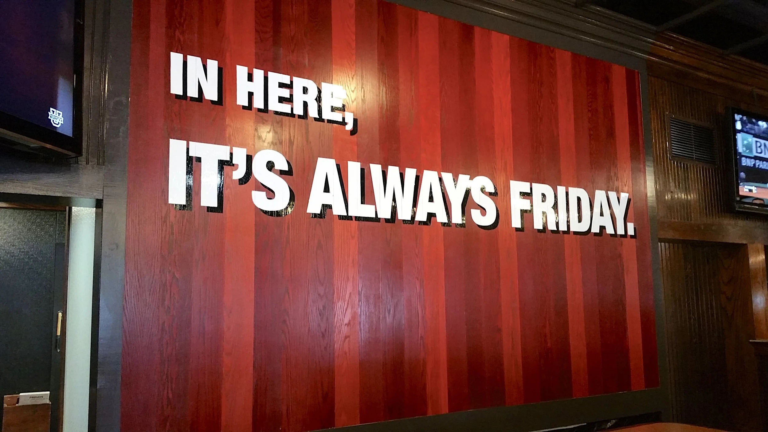 Restaurant branding case study - TGI Fridays - promise wall hand painted graphics