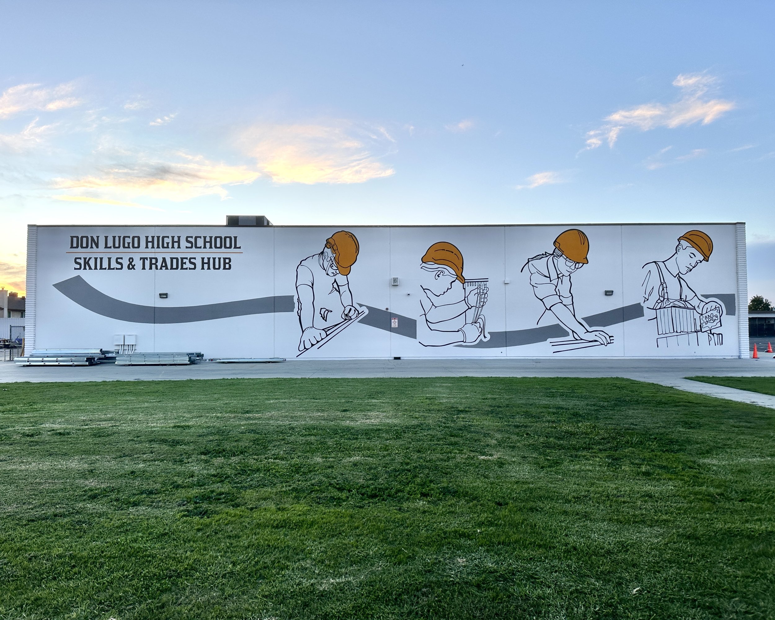 hand painted mural for construction trades building at high school