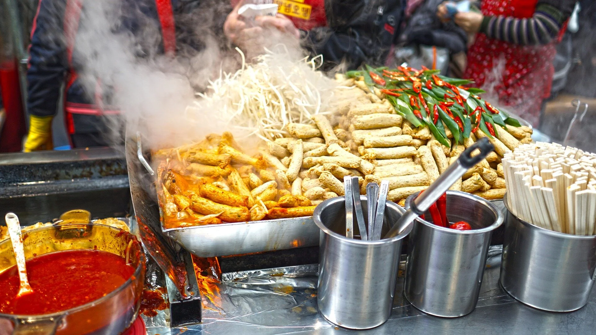 Fresh red chiles with plenty of fire engine red spicy sauce to smother delicious street food.