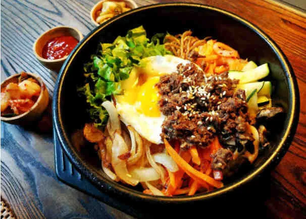 BIBIMBAP aka Mixed Up Rice with whatever leftover banchan (side dishes) you have in the fridge. Add GOCHUJANG. Cue happiness.