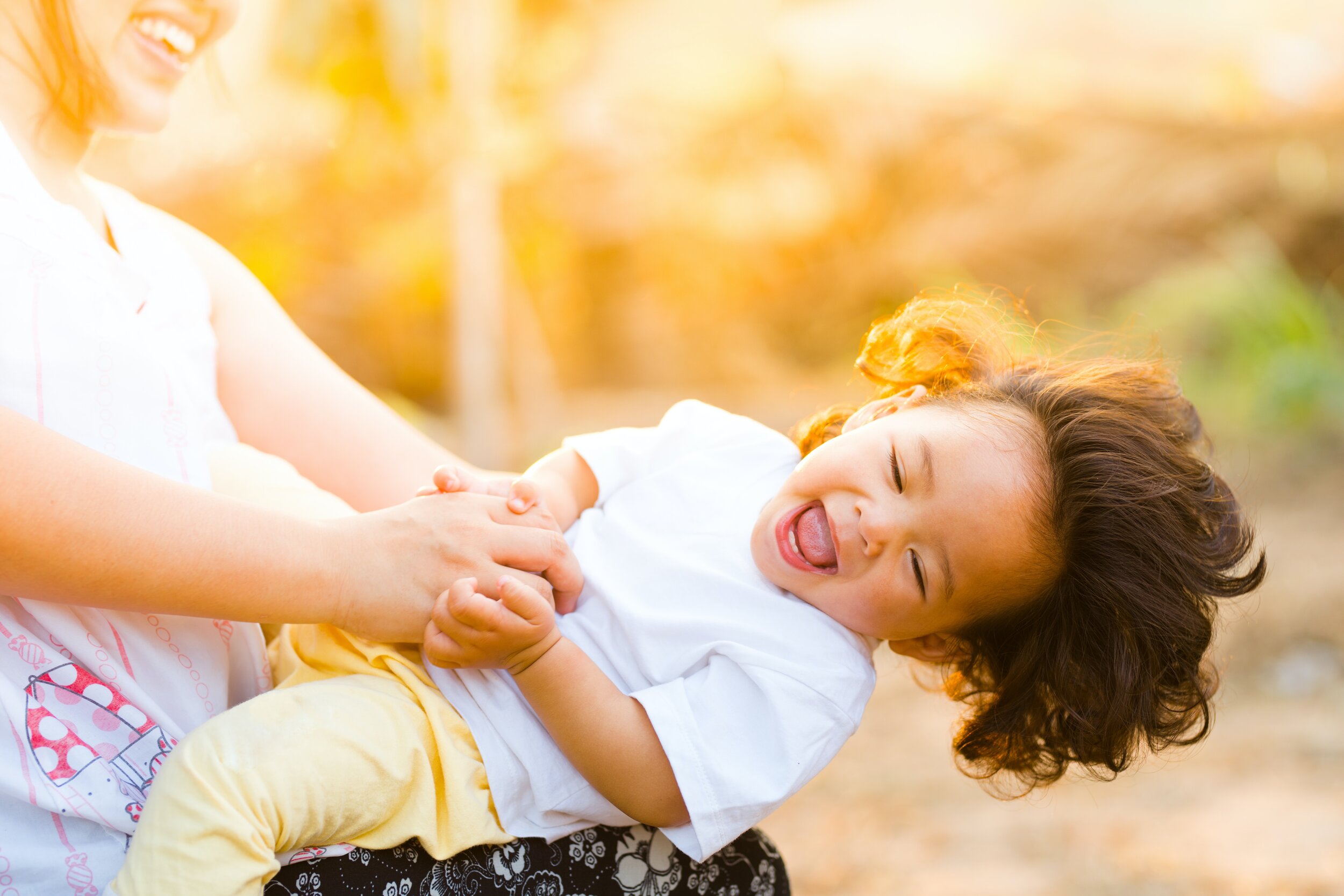 woman-holding-baby-smiling-1116050.jpg