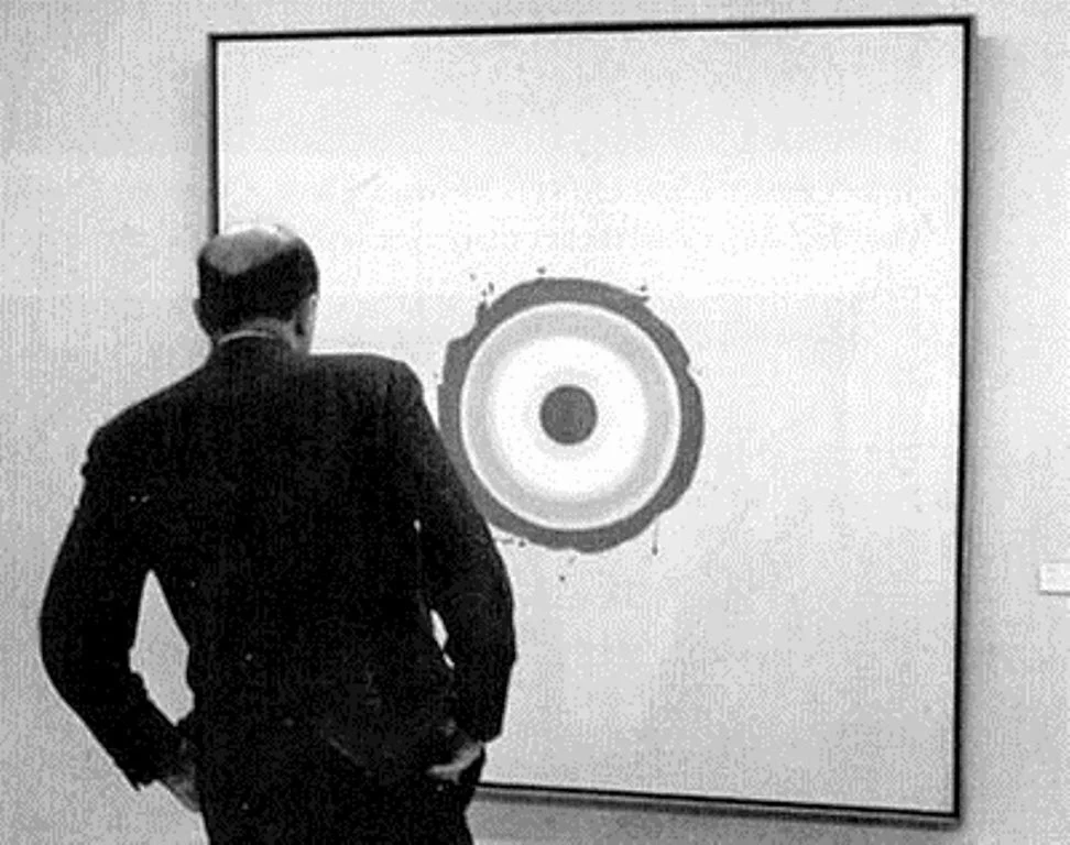 Greenberg+studies+a+Kenneth+Noland.jpg