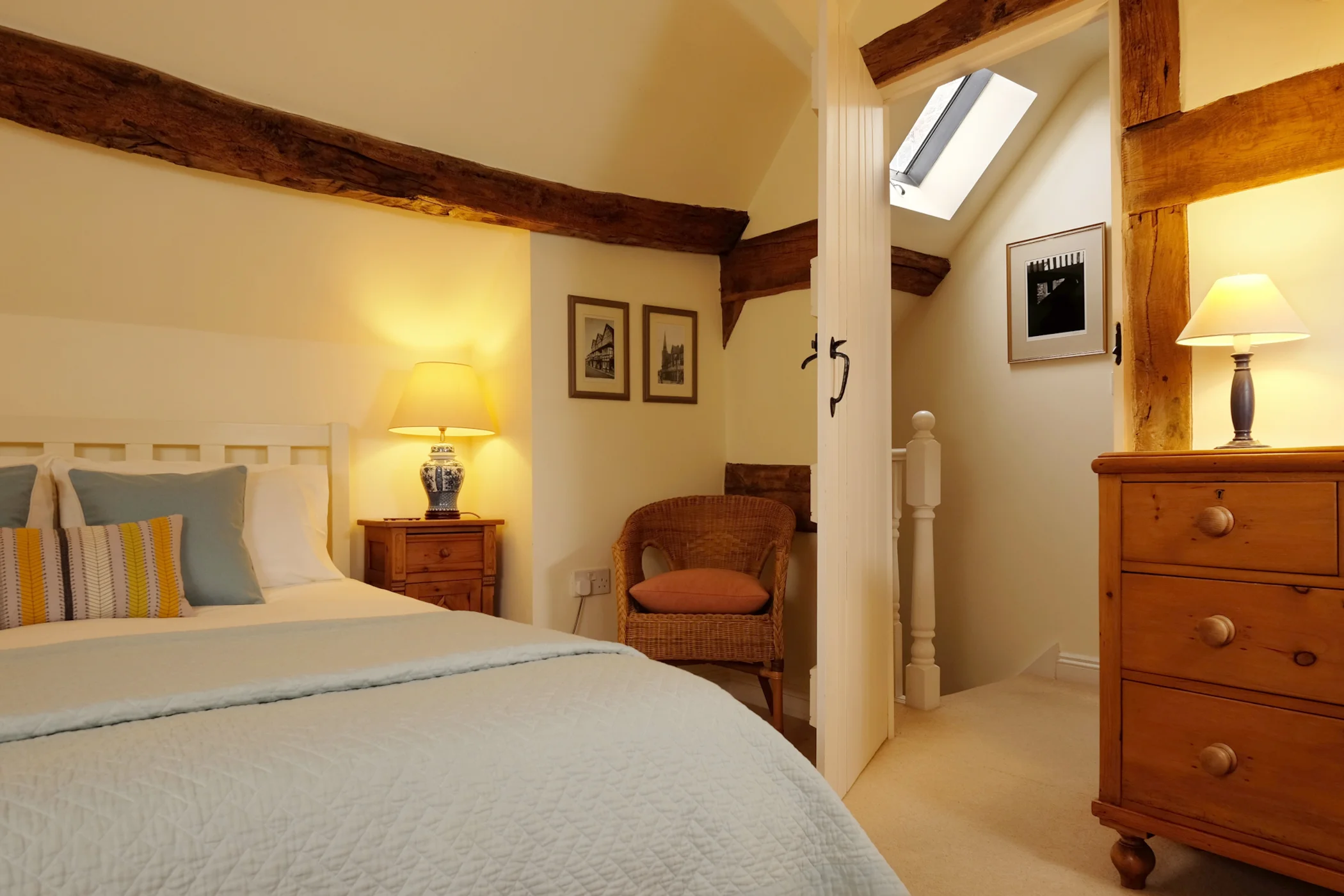 Cottage bedroom and view to landing