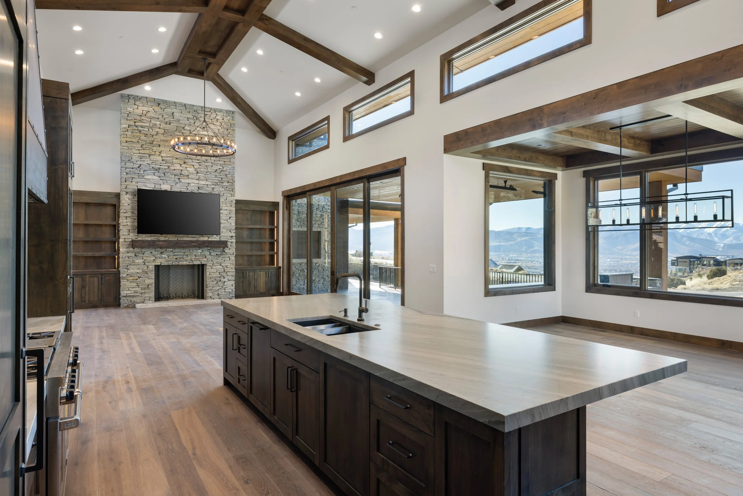 Custom kitchen and great room in a Red Ledges home built by Beacon Rock Builders