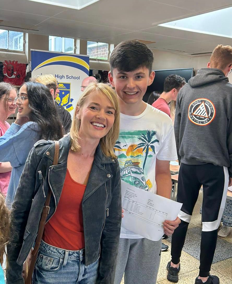 Mrs Rainey and Ryan McNeill enjoying the excellent results.JPG