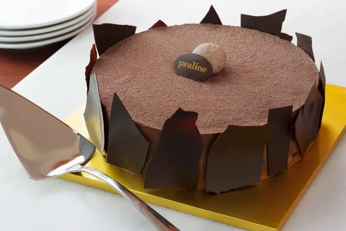 Chocolate Mousse Chocolate sour cream pound cake layered with dark chocolate mousse and decorated with homemade dark chocolate pieces 42.00