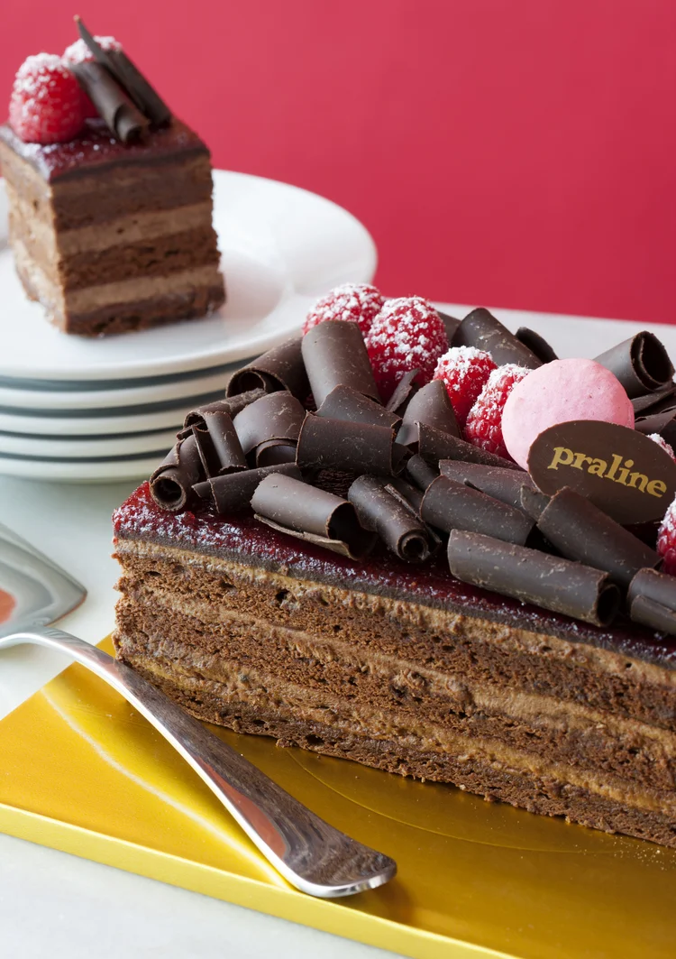 Chocolate Raspberry Pavé Layers of chocolate cake, whipped chocolate cream and raspberry jam; garnished with homemade chocolate curls and fresh raspberries 42.00