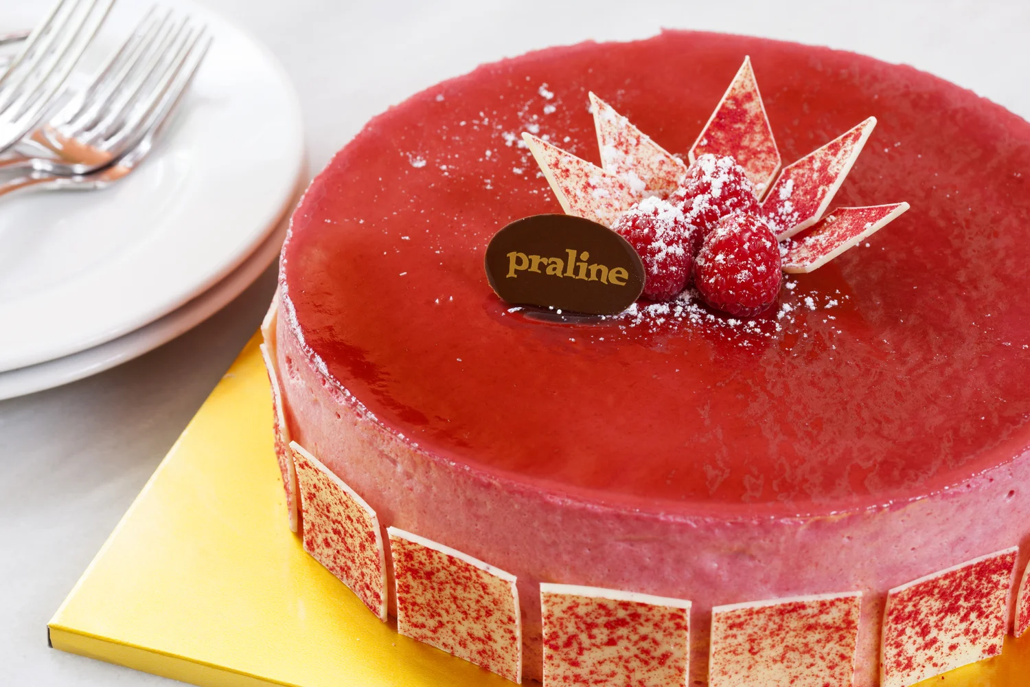Raspberry Mousse Chocolate cake topped with sultane cream and fresh berries and covered with raspberry mousse 42.00