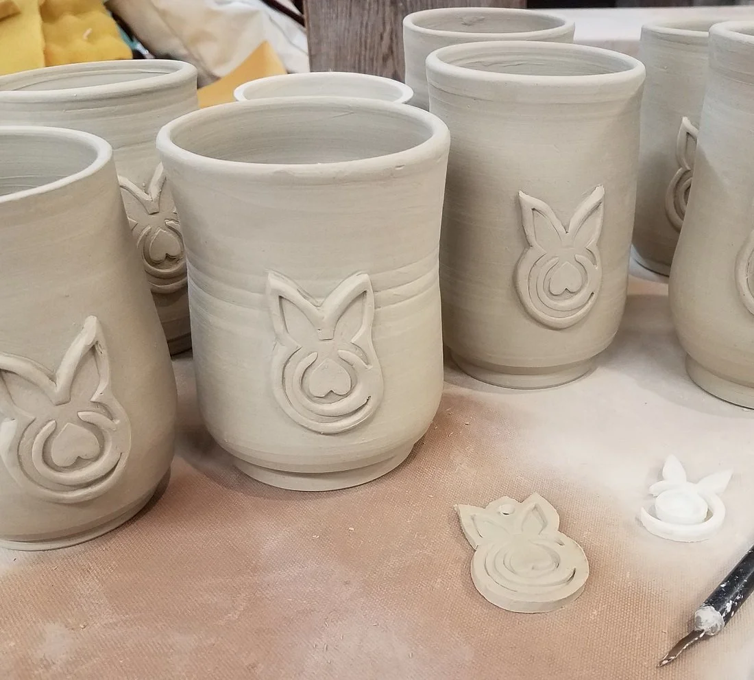 1x1 mh mugs.jpg