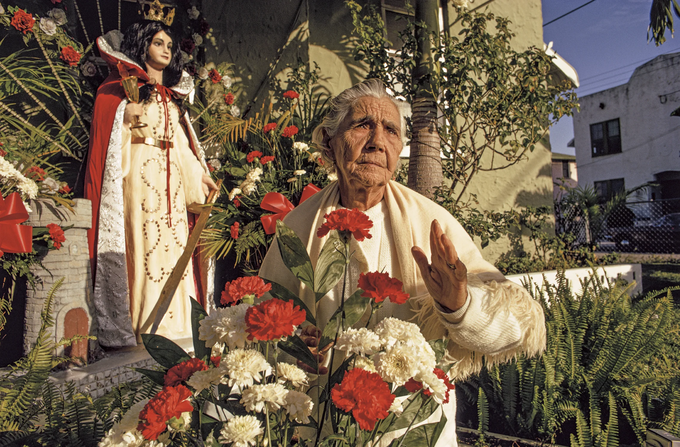 Cuban-born grandmother with her patron saint | Abuela cubana con su patrona, Little Havana