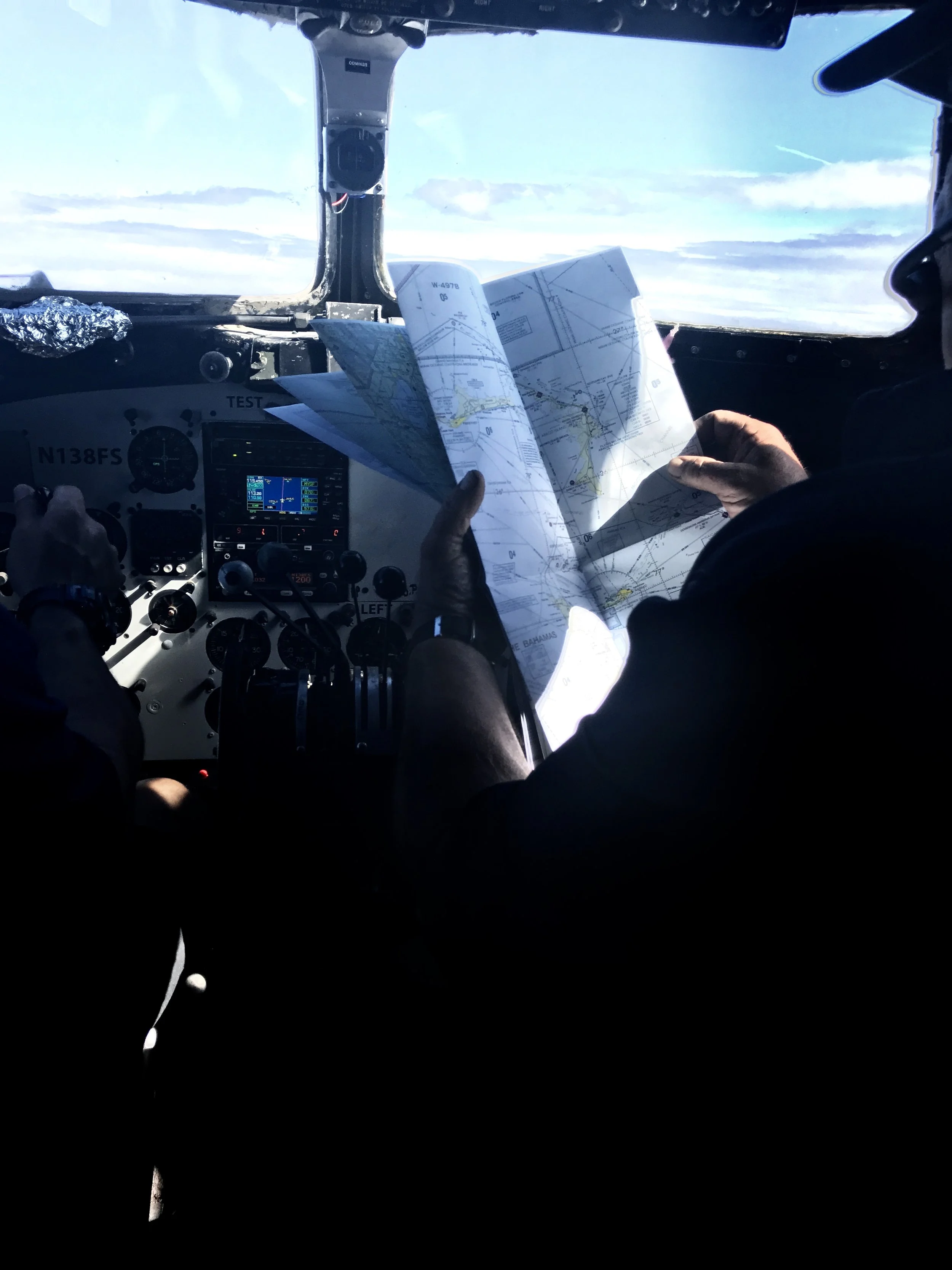 A view from the jump seat inside a Douglas DC-3 Flying from Orlando, Florida to the Bahamas on a cargo delivery.
