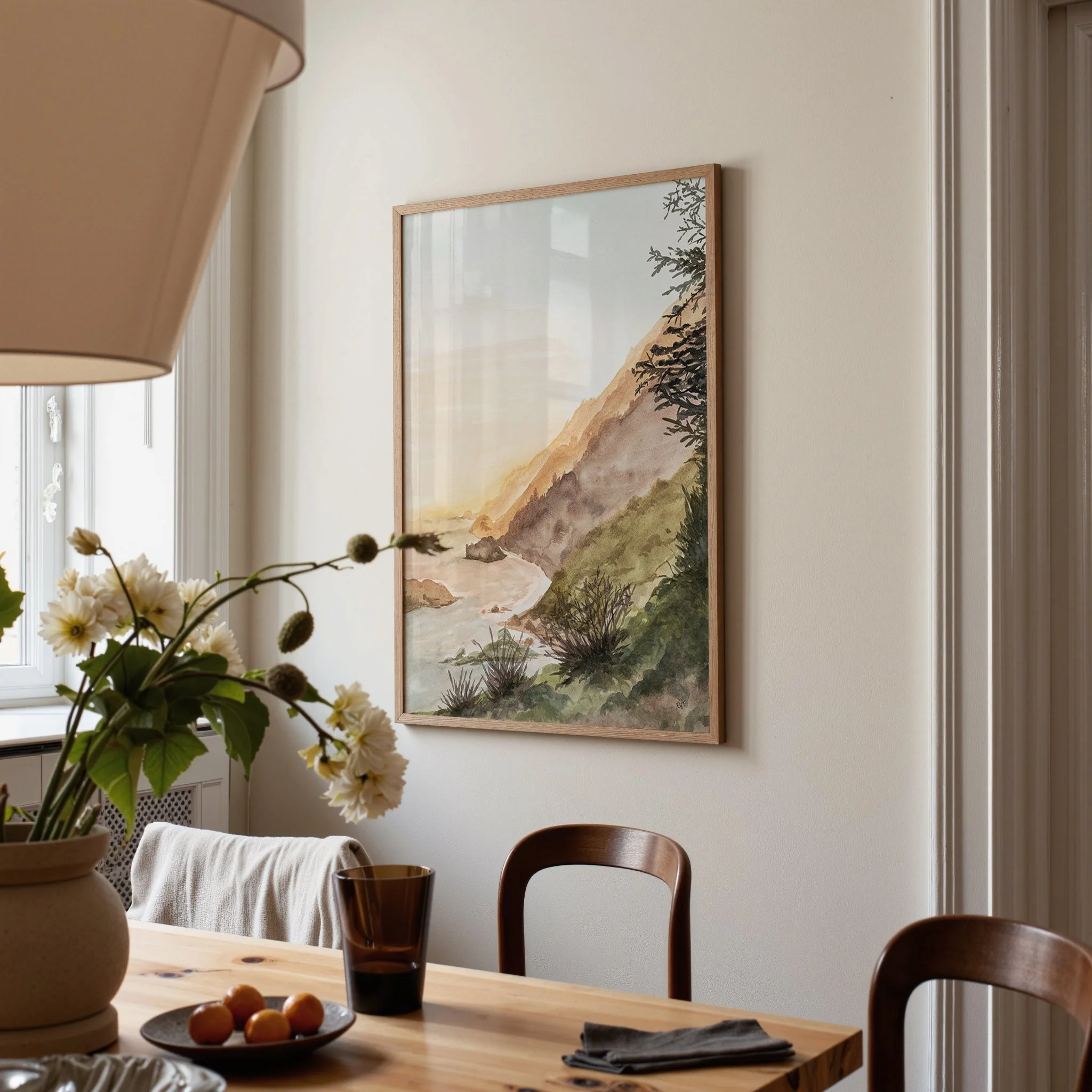 Watercolor landscape wall art print of Big Sur on the California Coast at Sunset golden hour on the Pacific Ocean in a dining room