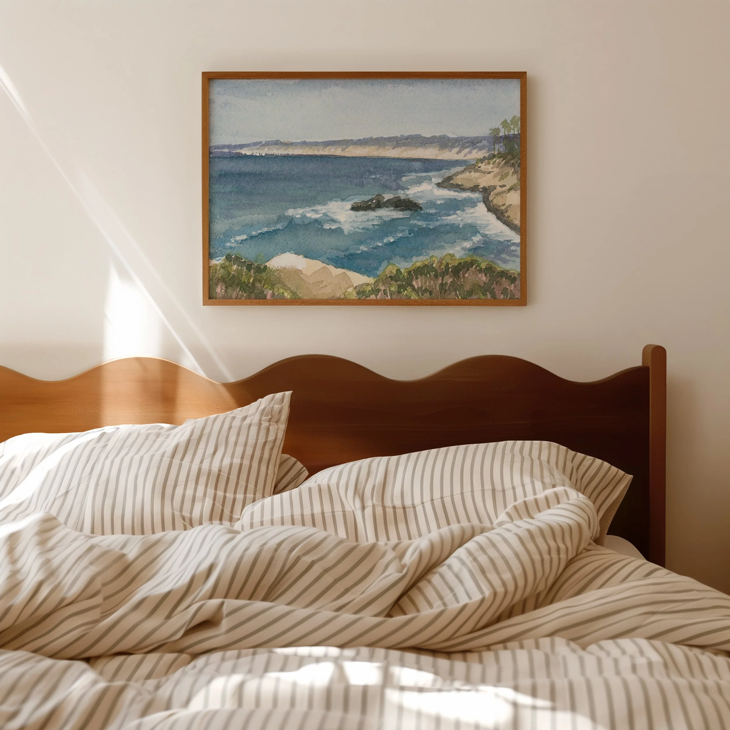 La Jolla, California coastal watercolor landscape wall art print. San Diego cliffside beach giclee fine art hanging above a bed