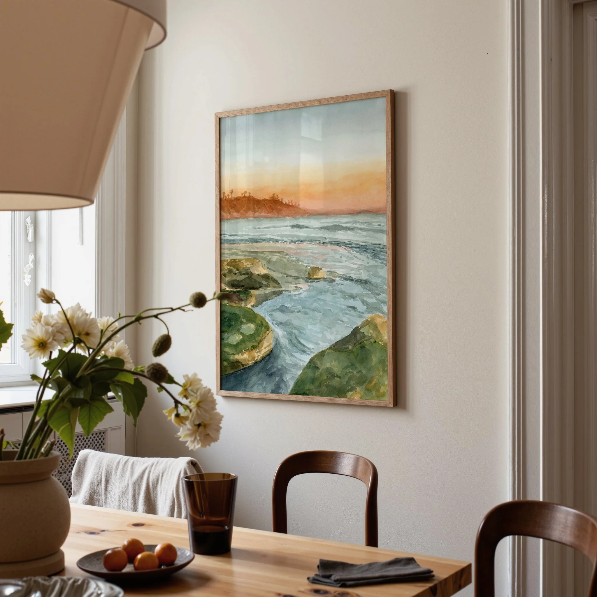 Swami's Beach, Encinitas coastal watercolor landscape wall art print inspired by tide pools along the Southern California coastline during sunset hanging in a dining room