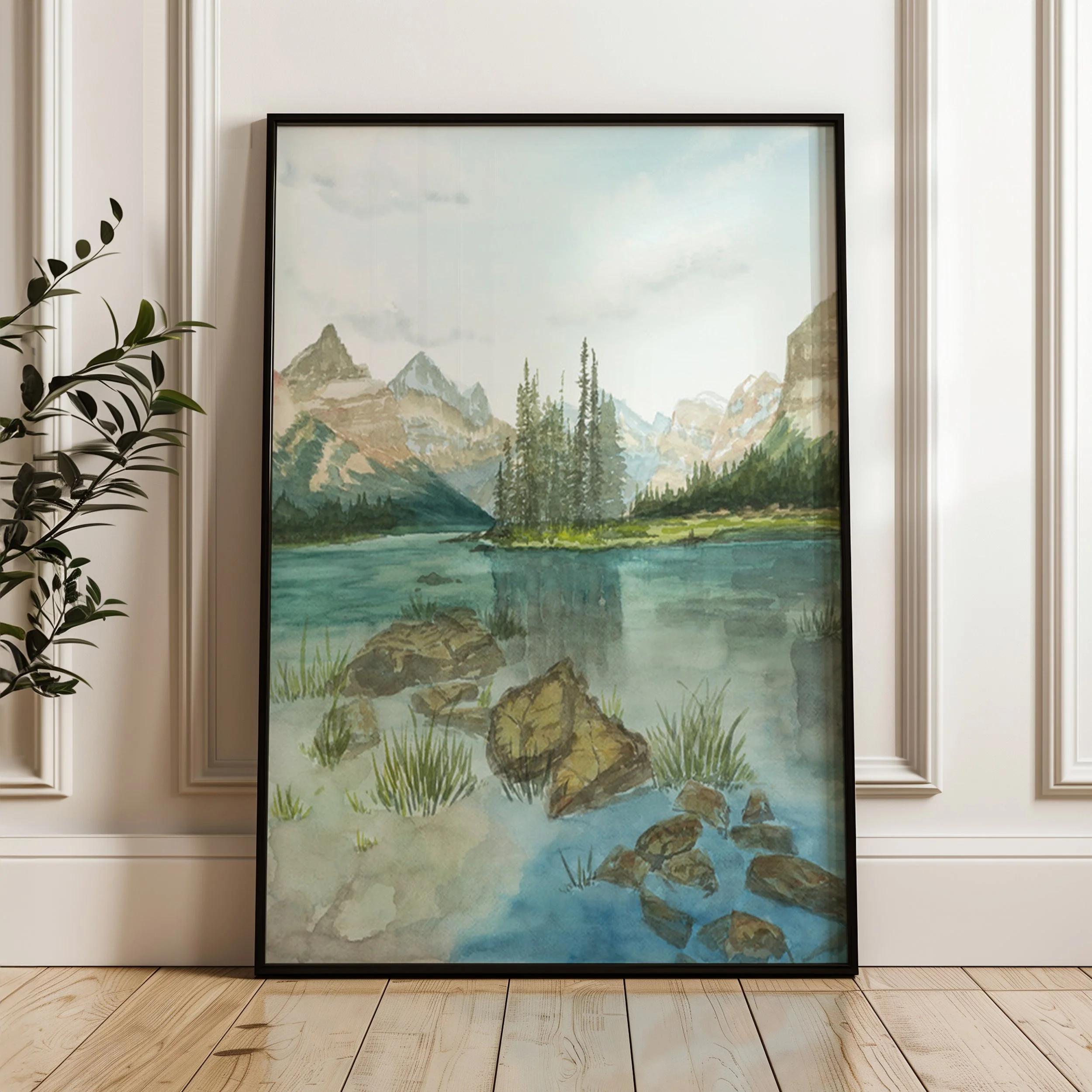 Spirit Island, Jasper National Park watercolor mountain landscape wall art print inspired by towering peaks and vibrant blue mountain lakes in the Canadian Rockies displayed in a black frame
