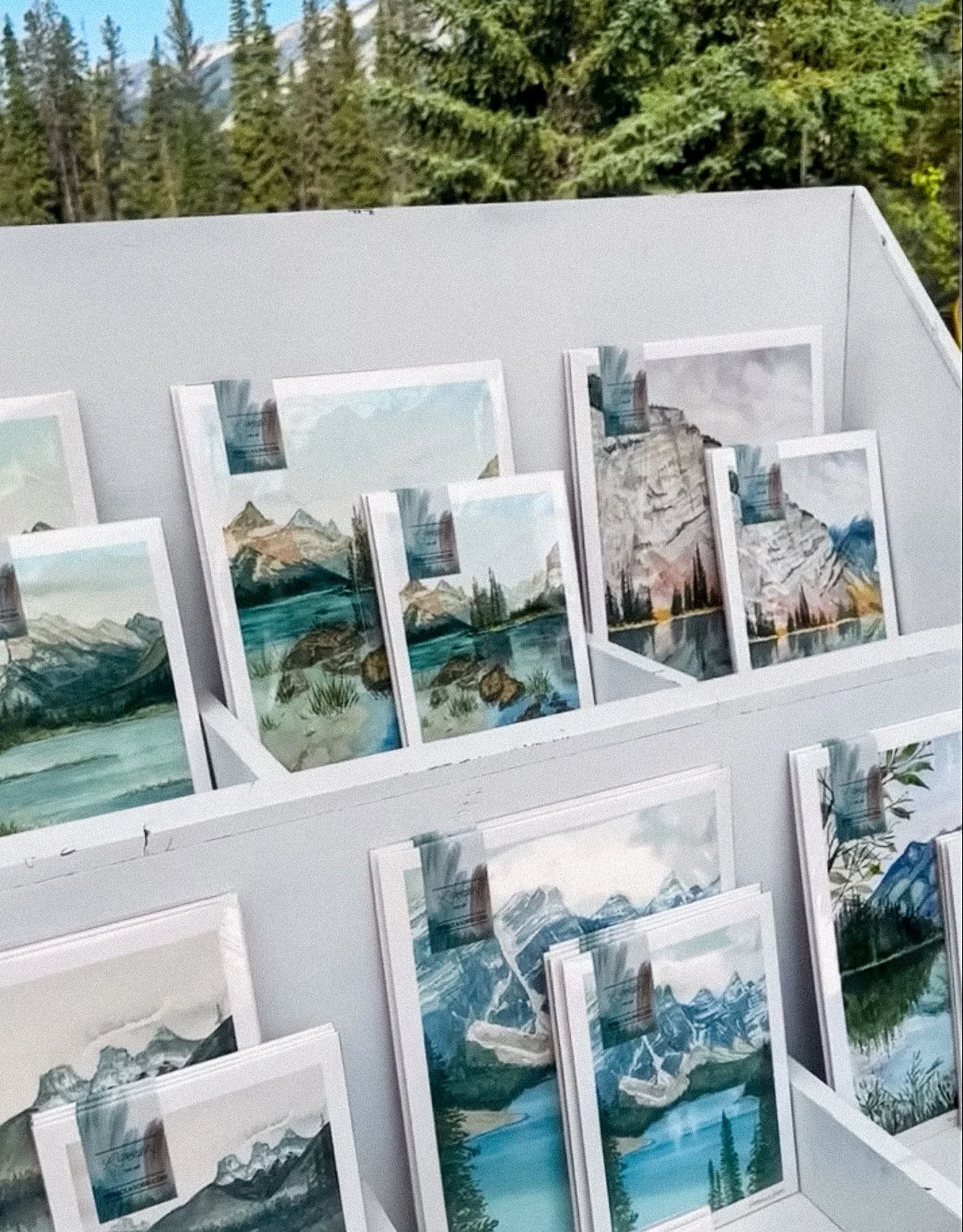 Mountain Watercolor Art Prints displayed at the Banff National Park Summer Market