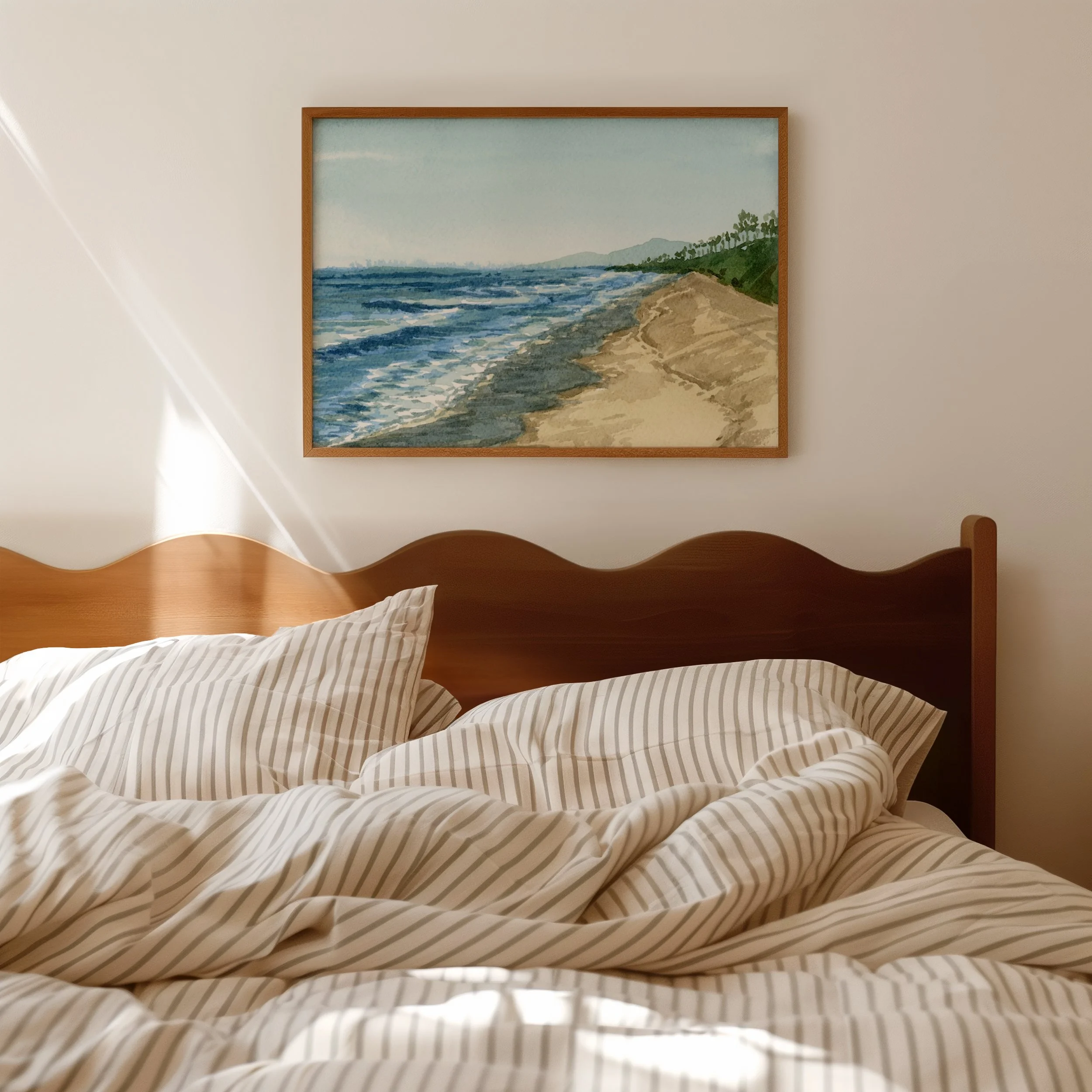 Tamarack Beach, Carlsbad coastal watercolor landscape wall art print inspired by the vibrant blue Pacific Ocean off Southern California's coastline hanging in a bedroom