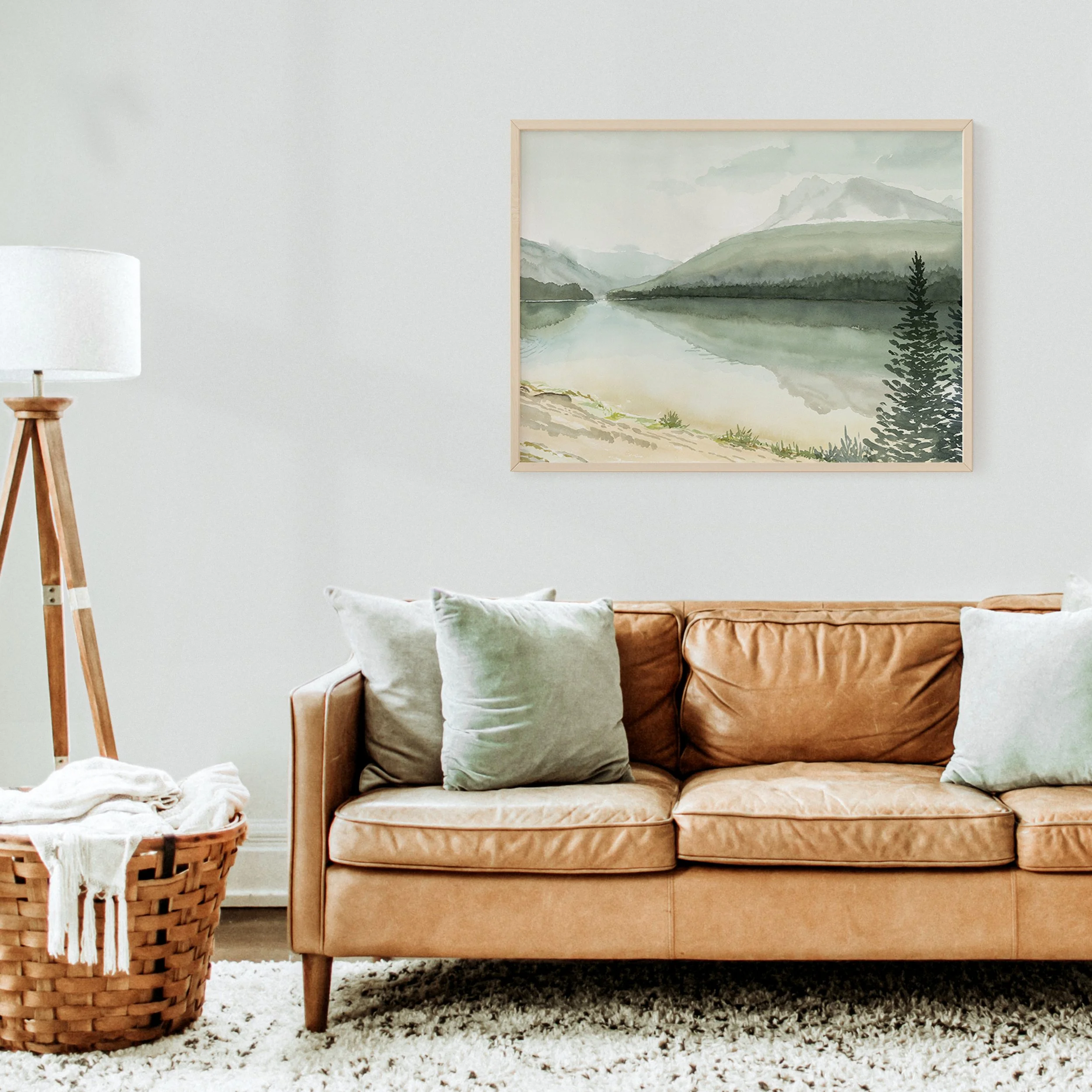 Banff National Park spring reflections watercolor landscape wall art print inspired by Spring in the Canadian Rocky Mountains. Soft, serene, tranquil nature giclee art hanging above a leather couch