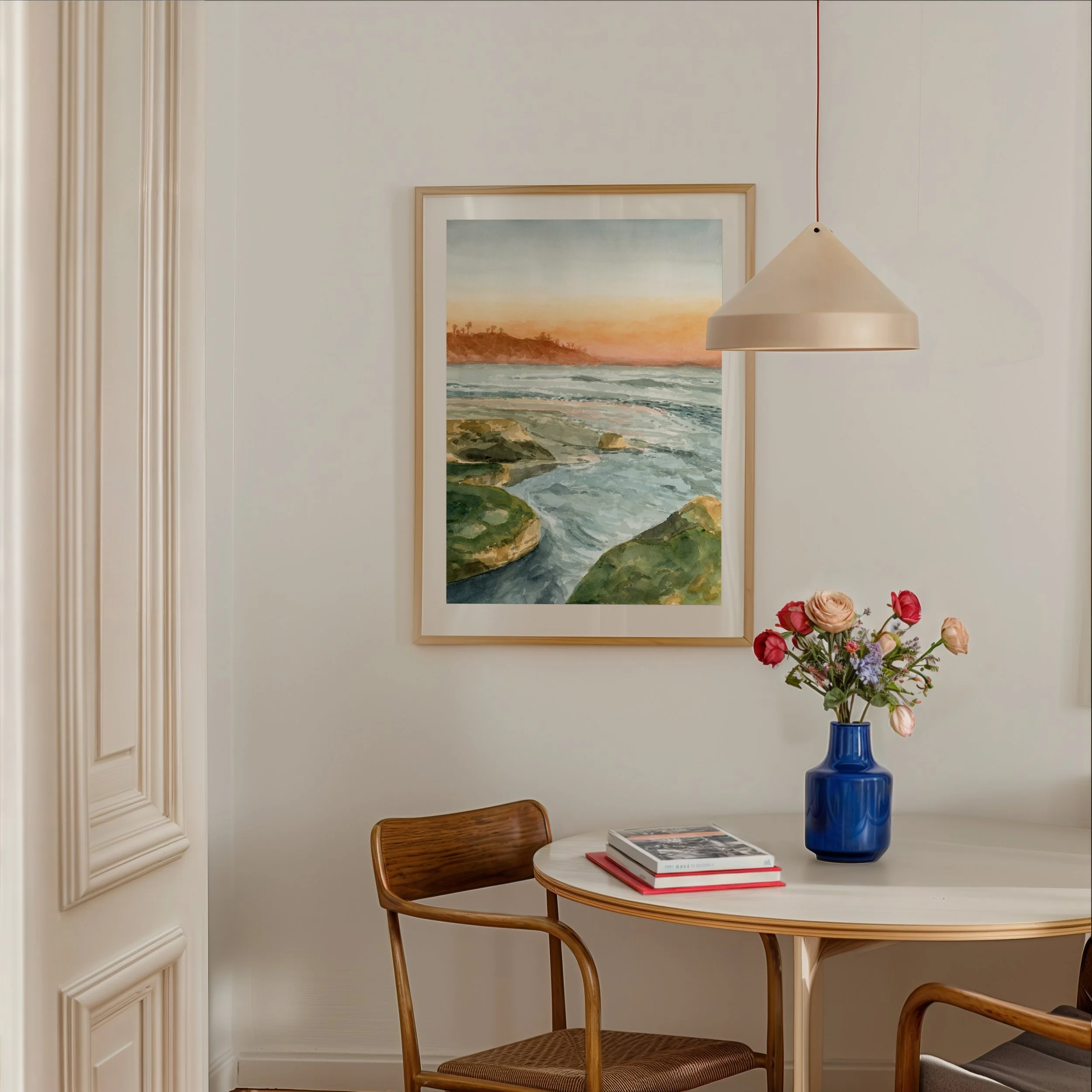 Swami's Beach, Encinitas coastal watercolor landscape wall art print inspired by tide pools along the Southern California coastline during sunset hanging in a dining room
