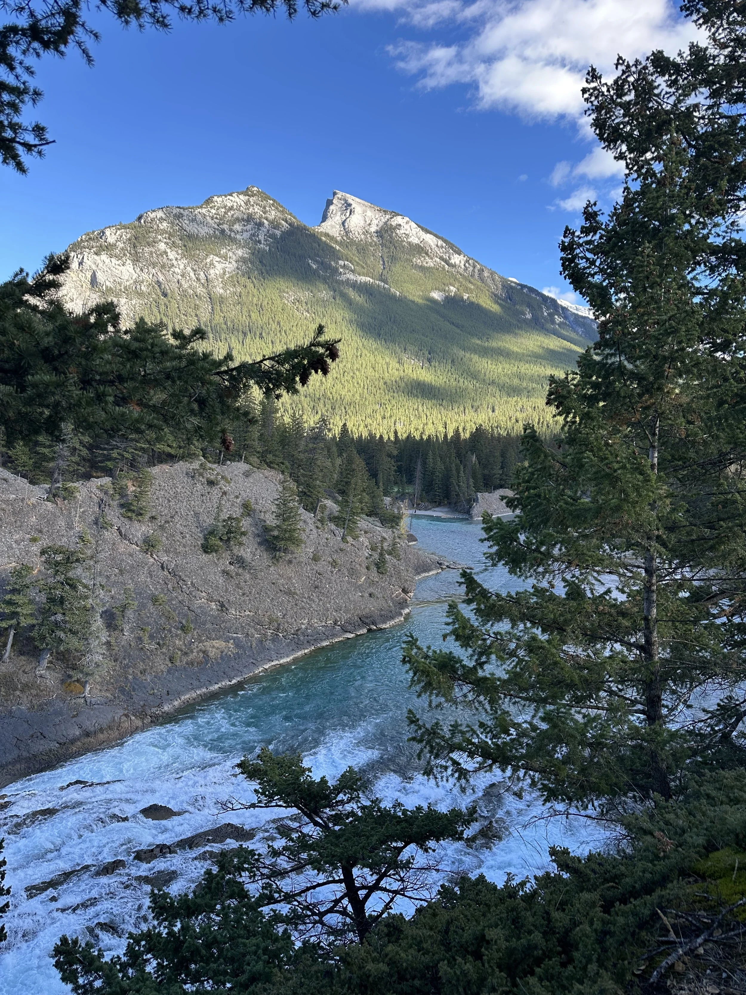 Rundle Mountain overlooking Bow Falls in Banff National Park in the Fall