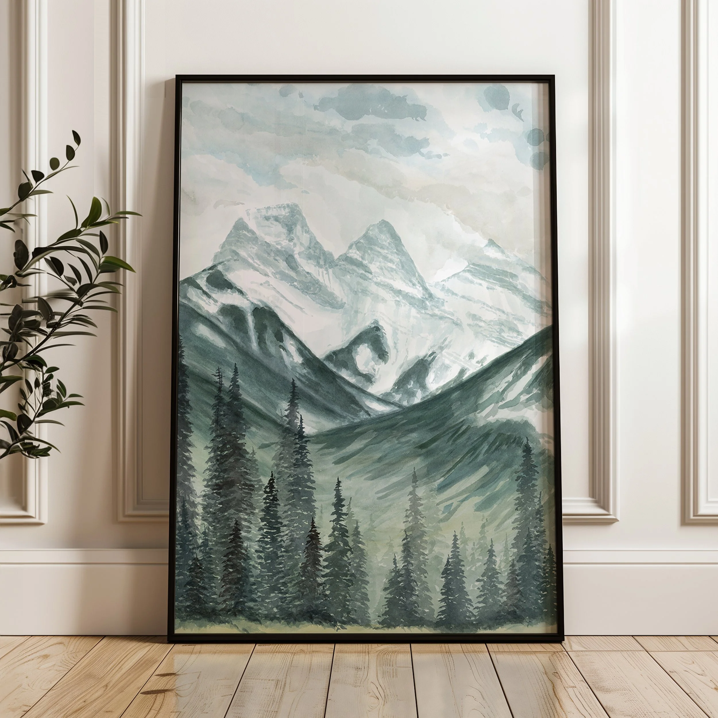 Three Sisters mountains, Canmore Alberta landscape watercolor wall art print inspired by snow capped mountains and towering evergreen trees in the Canadian Rockies in a black frame