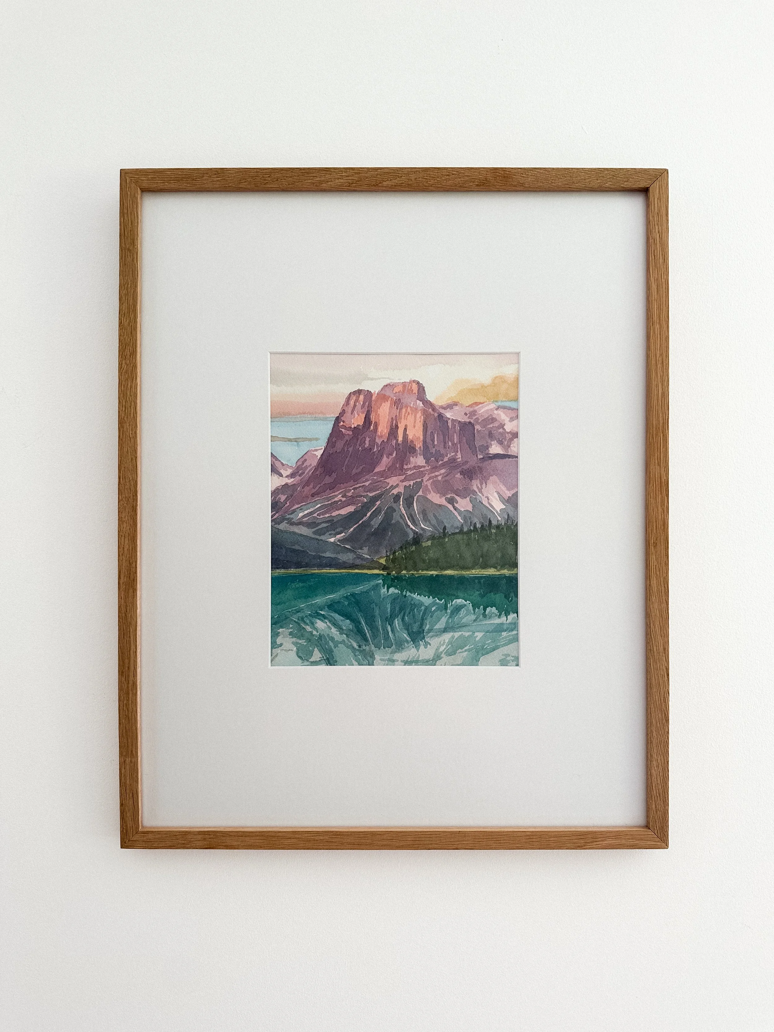 Original vibrant mountain sunset painting of Emerald Lake in Yoho National Park by Rebecca Sobbi