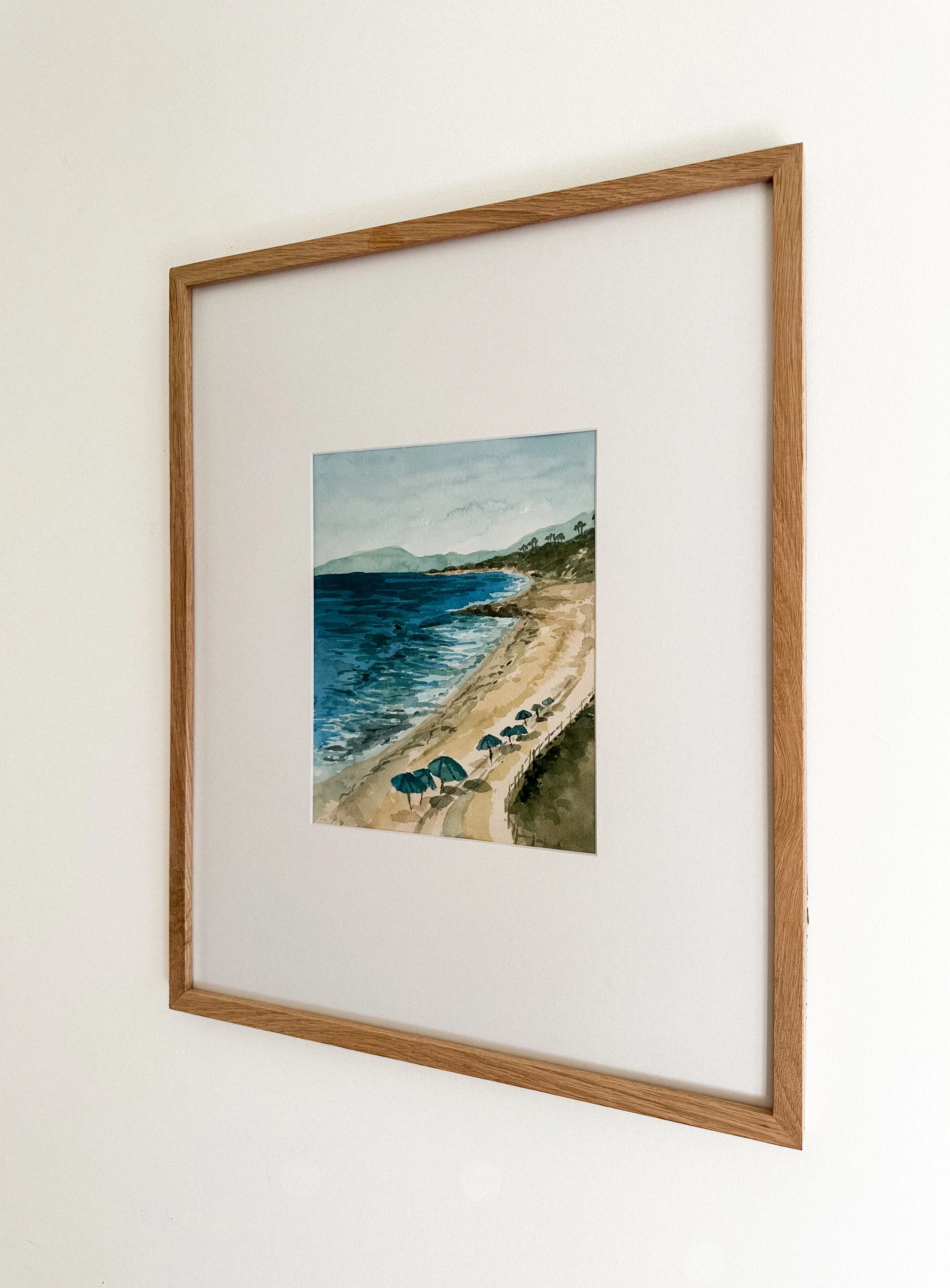 Soak in the Sunshine original coastal landscape painting of Ponto beach in Carlsbad, California sitting under a turquoise umbrella in the warm Pacific Ocean
