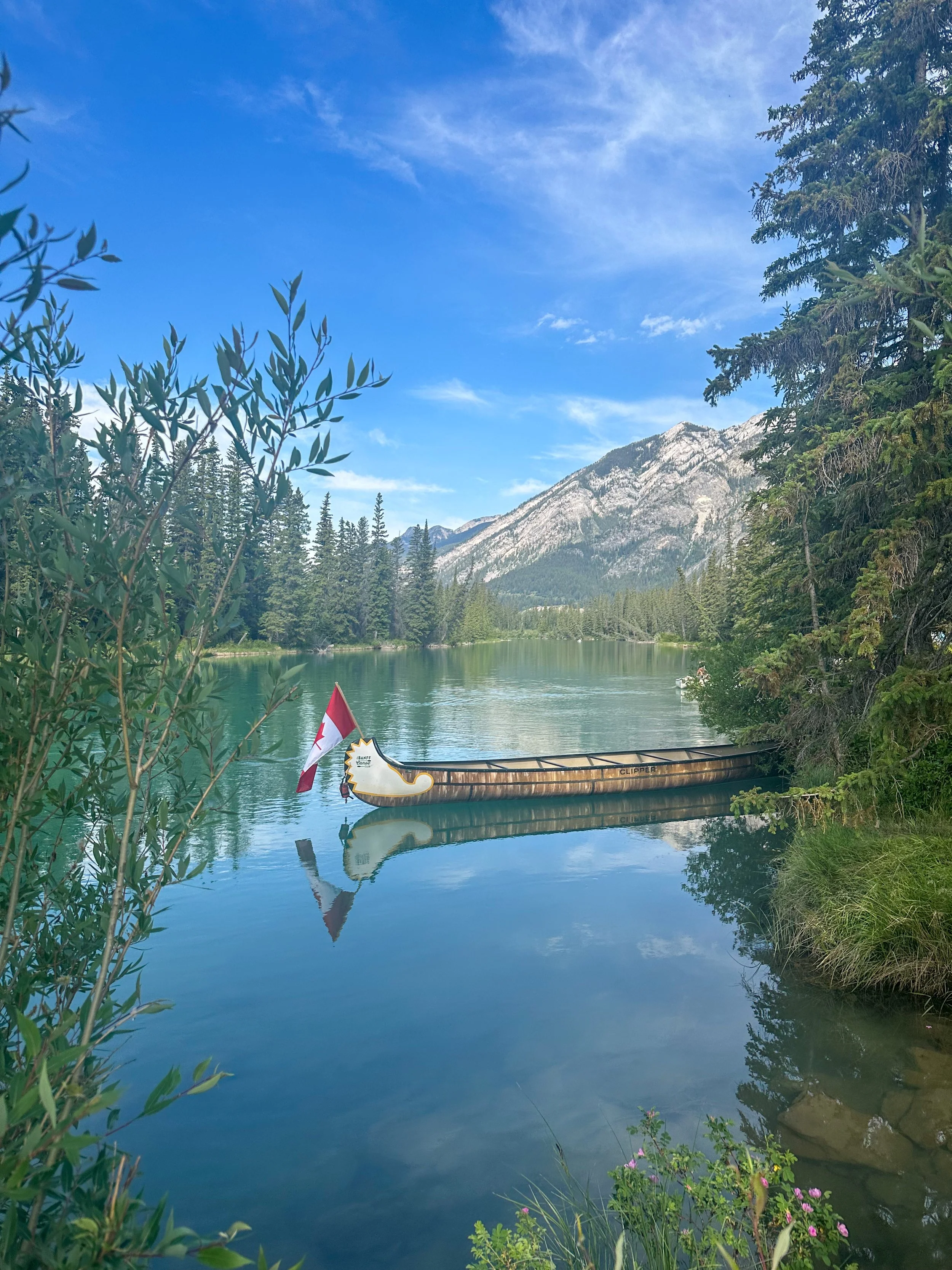 Canadian canoe on the Bow River in Banff National Park during Summer