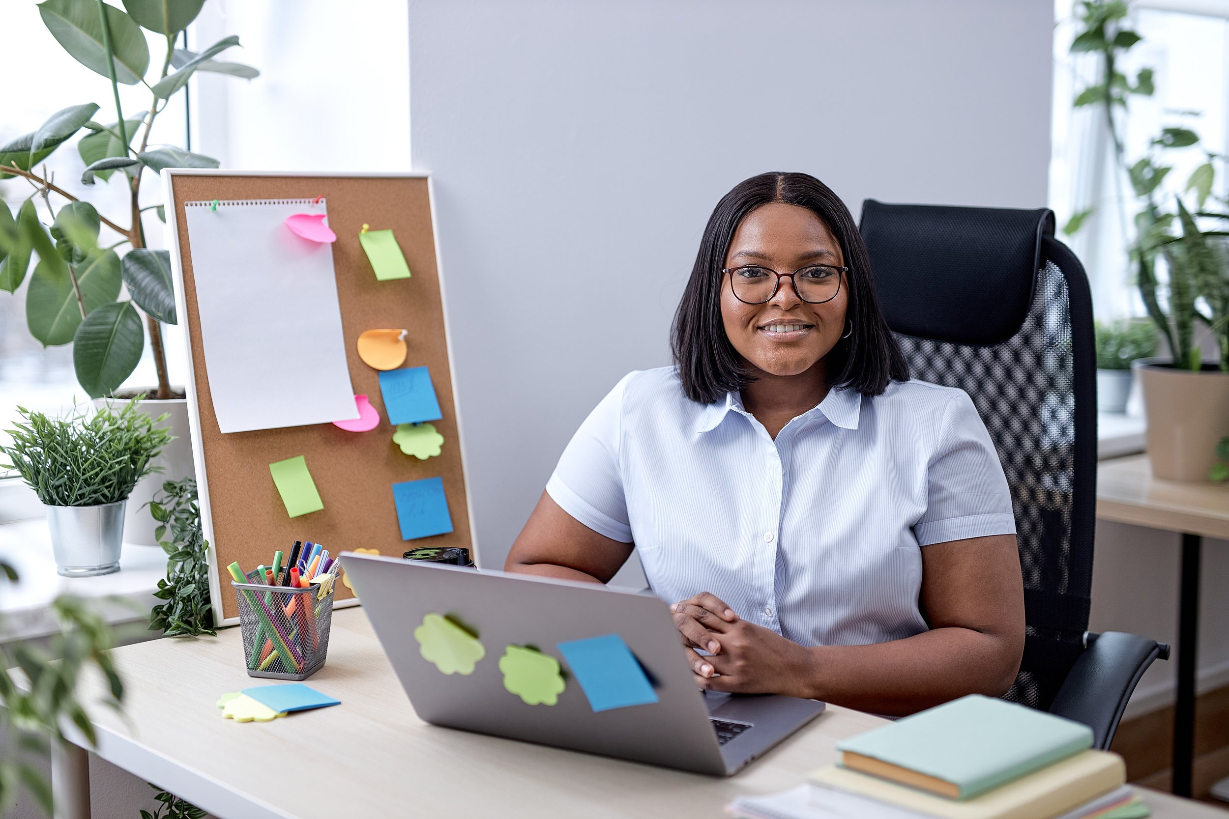 young-business-woman-working-laptop-office-sitting-office-desk-working-new-project-smiling-feeling-happy-beautiful-black-lady-formal-wear-success-business-concept.jpg