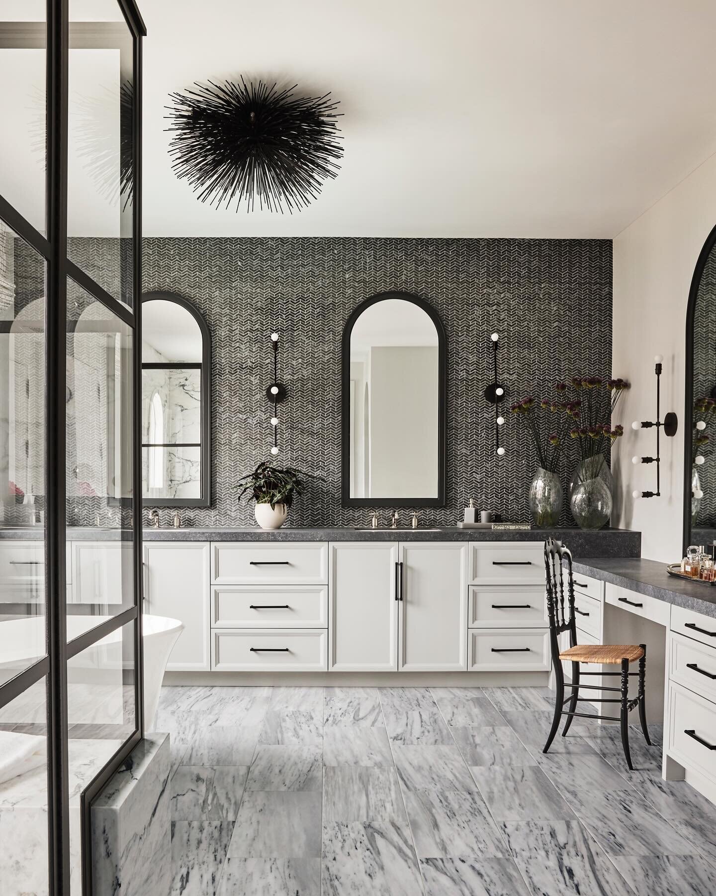 Calm, Soothing and Monochromatic. 
The Primary bathroom of our #manhattanbeach project as seen in @modernluxuryinteriors @interiorscalifornia 
Stone @annsacks 
Sconces  @apparatusstudio 
Cabinetry @boardandblock 

Photo @samfroststudio 
.
.
.
#jeffan