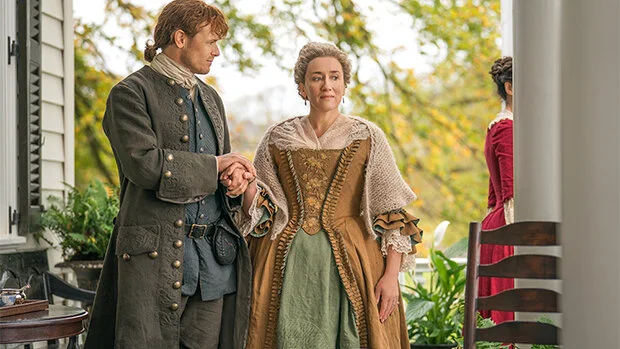 Maria Doyle Kennedy and Sam Heughan as Aunt Jocasta and Jamie