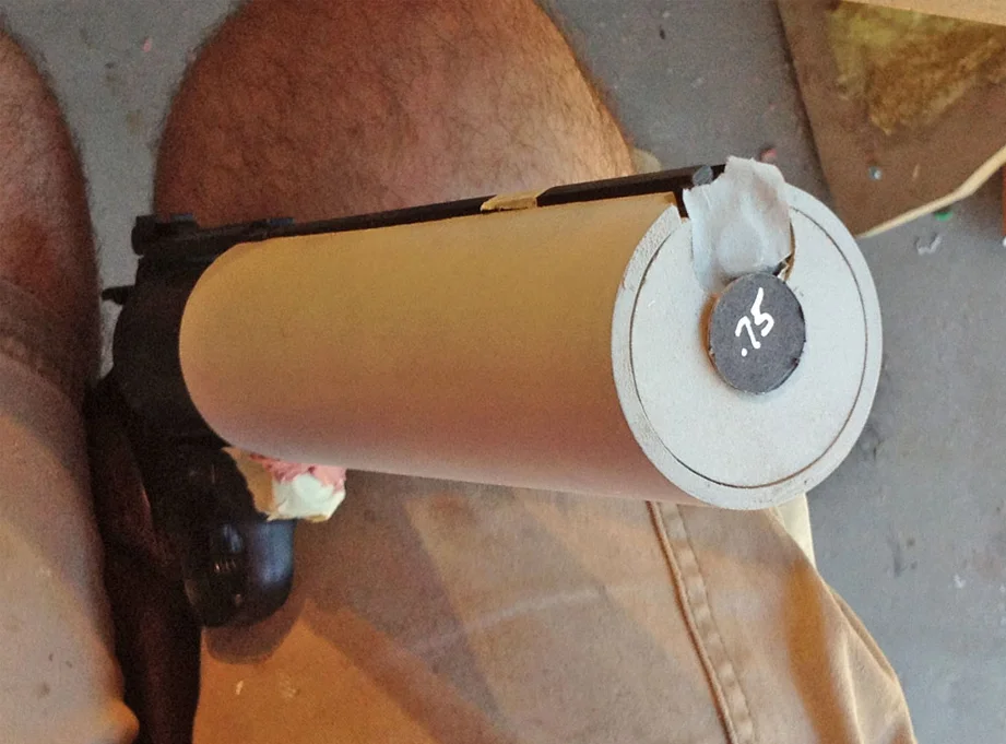 To figure out how big the barrel should be (and by extens the bullet that it shoots), I cut black poster board to show the client.