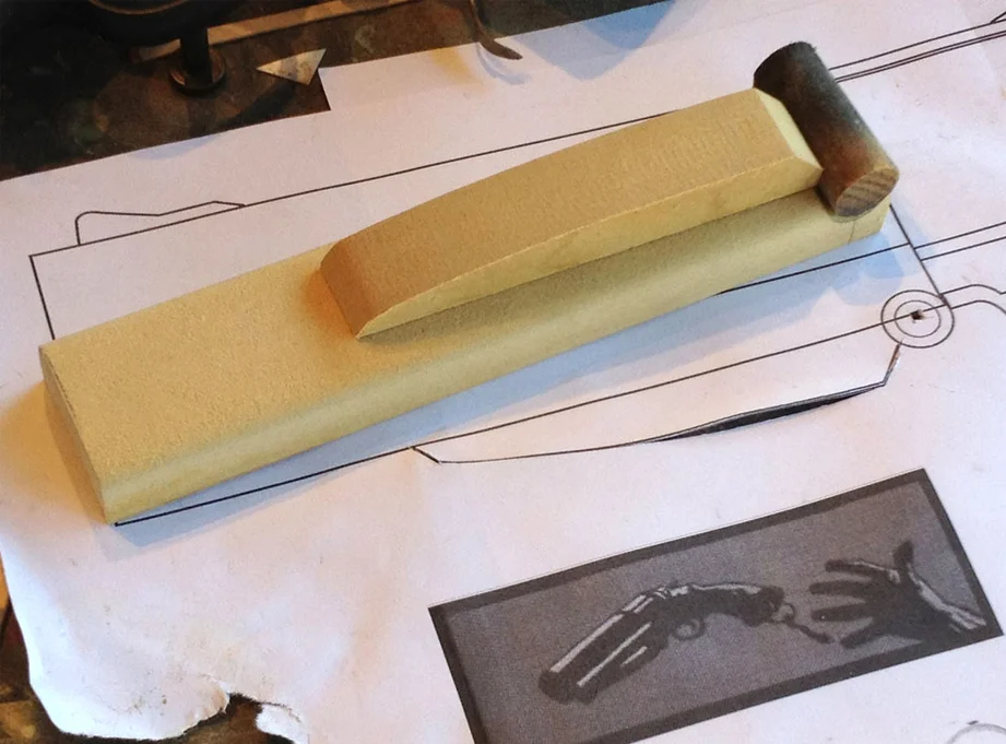 For the supporting pieces under the barrel, I cut MDF and a wooden dowel for the (non-functional) hinge.