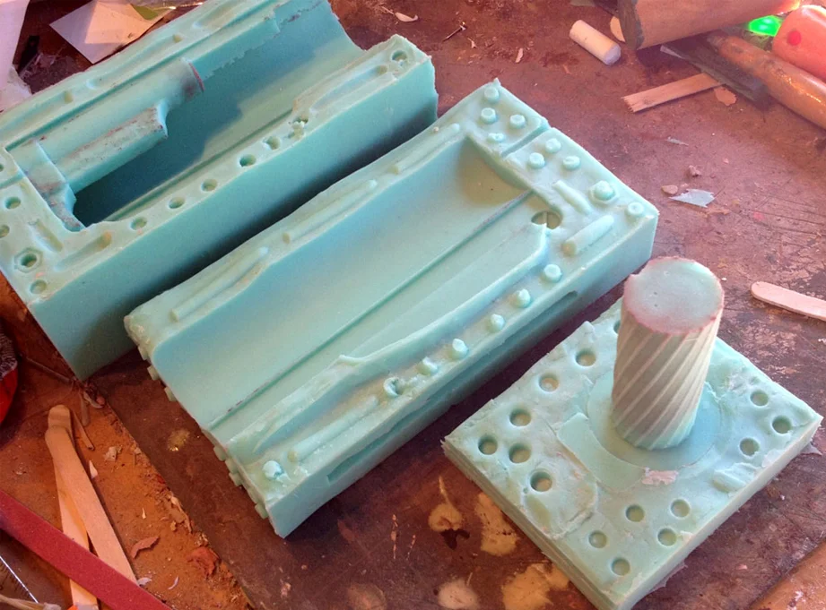 After the sides cured, I poured the end. This was a tough shape to mold and I ended up breaking the master just de-molding it. I also had air bubbles in recesses that would not have been a problem if I had cut the master in half. But, in the end, I have a working mold…no use crying over spilled milk.
