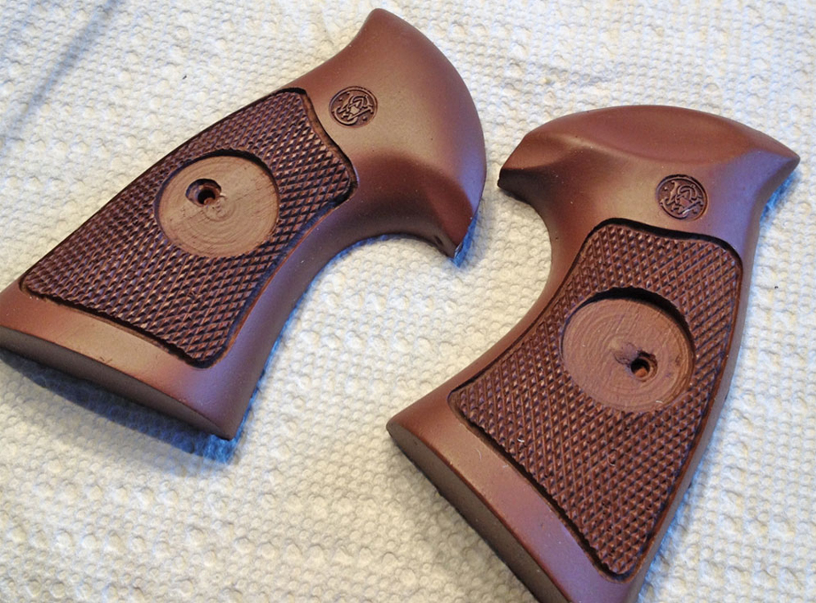  The client was getting his original wood grips so I had to paint my resin copies. I started with a base coat of dark brown. 