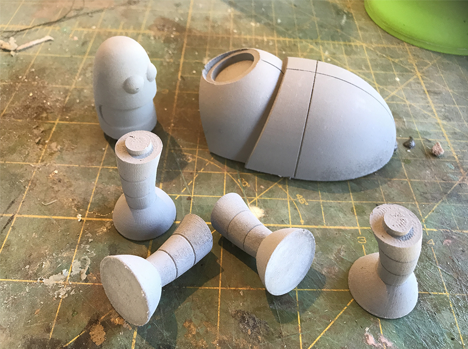  The remaining parts with a coat of filler primer. You can still see some print marks but a quick sanding removes most of them. The cleanup is very easy. 