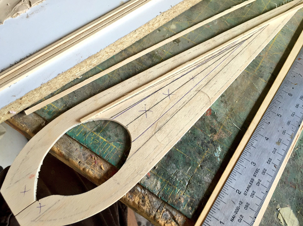 The blade profile was cut from 1/8" plywood. I used balsa wood to frame out the high ridges of the blade.