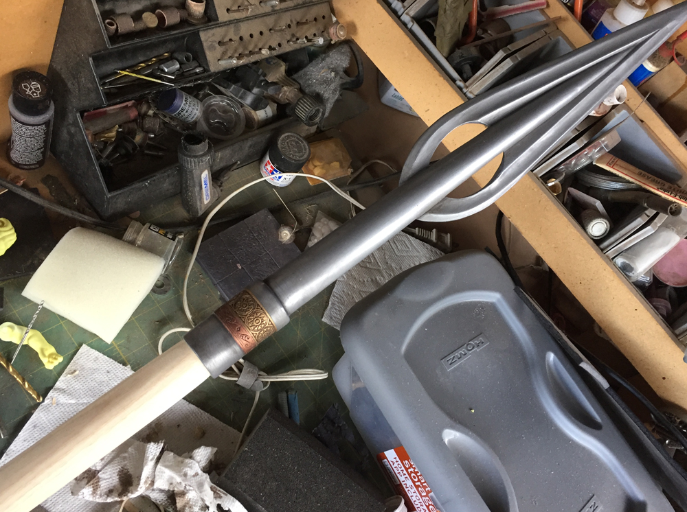 The spear head glued on the shaft.