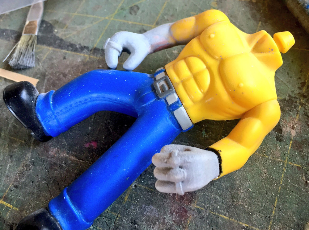 I cut off Willie’s hands and glued the new hands on with JB Weld epoxy.