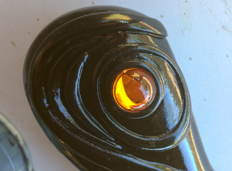  An acrylic gem was glued into each side of the pommel. 