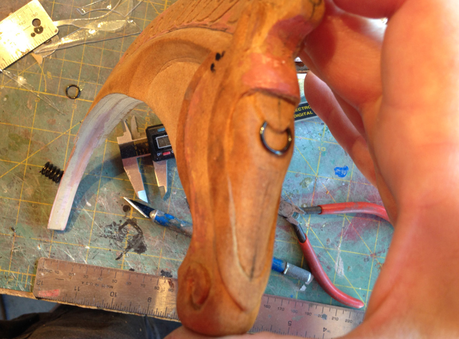  Since it would have been super hard to sculpt, I cut a link from a spring for the ring on the horse’s forehead. 