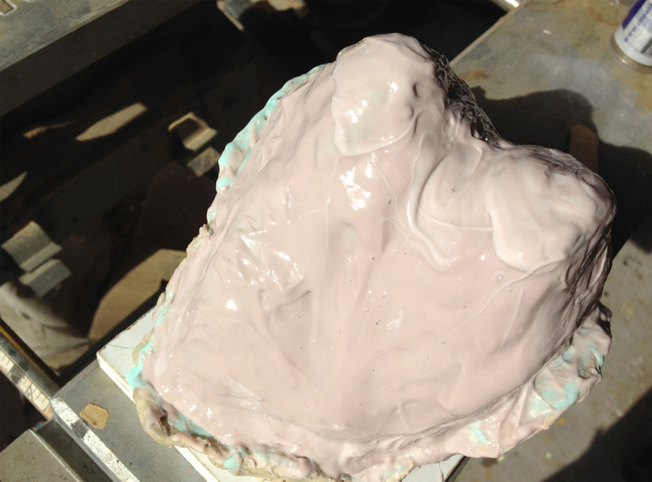 A silicone mold was brushed onto the master.